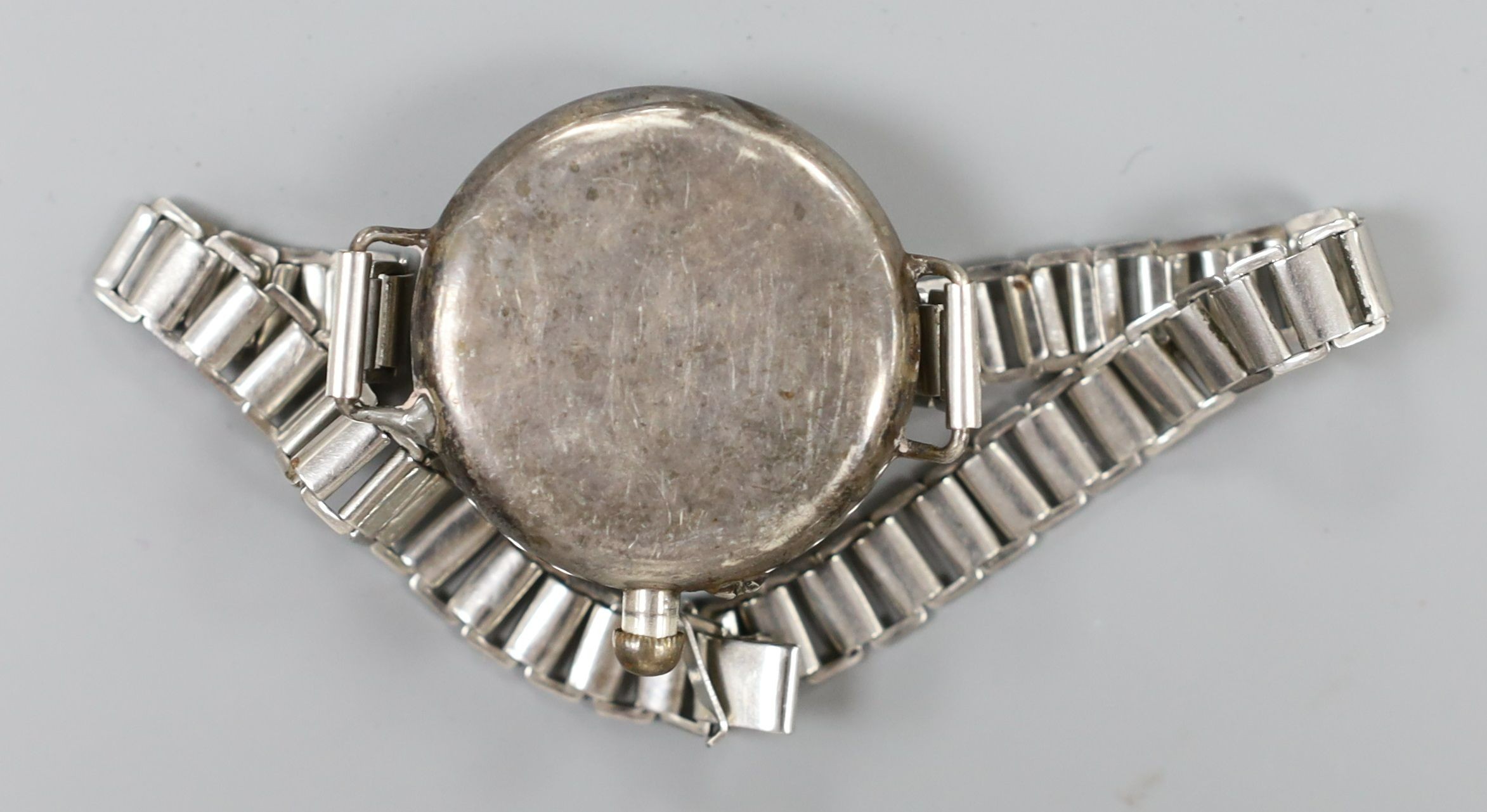 A gentleman's early 20th century silver Borgel cased manual wind wrist watch, on a metal bracelet.